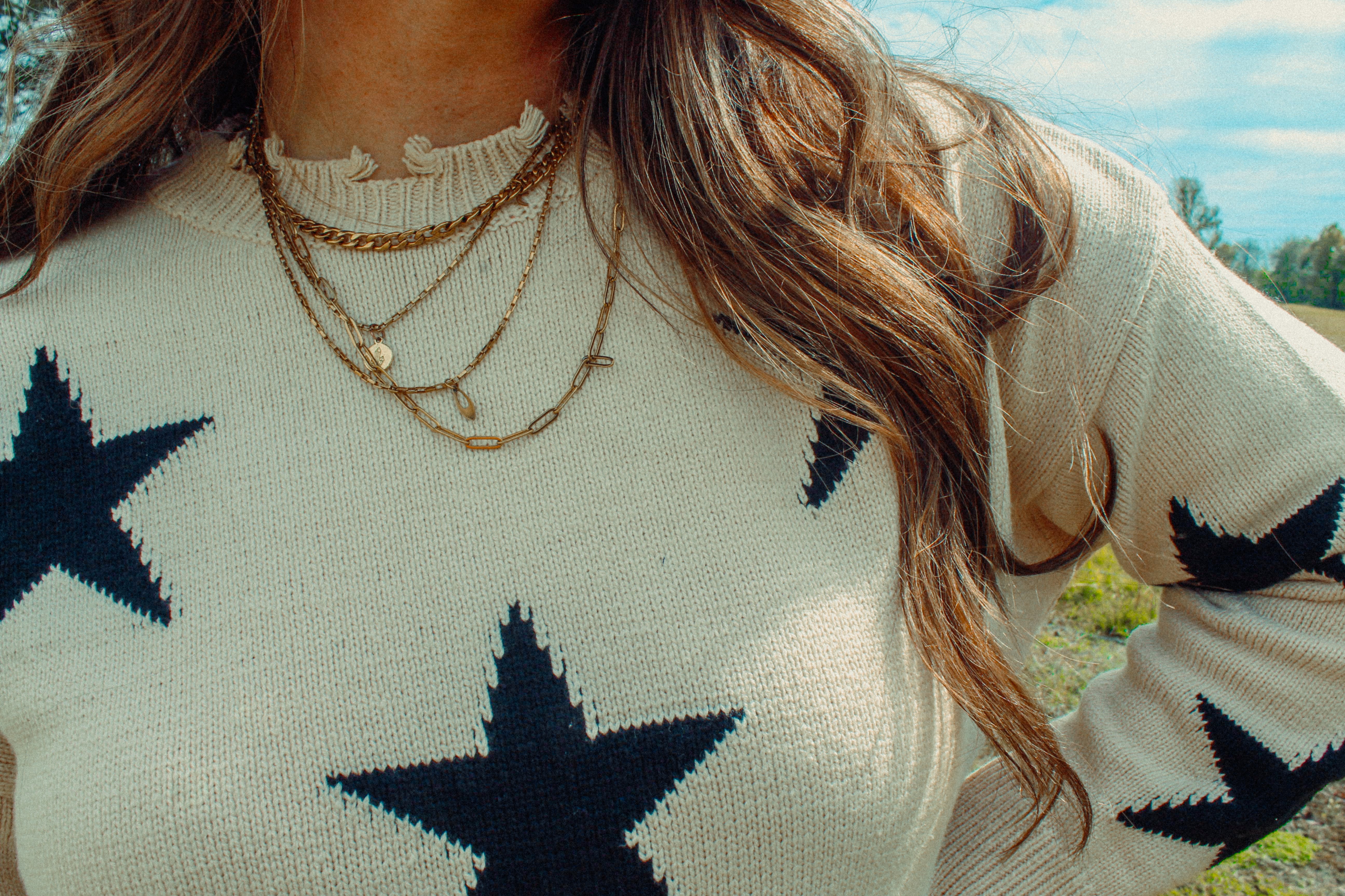 Distressed Star Print Cotton Blend Sweater