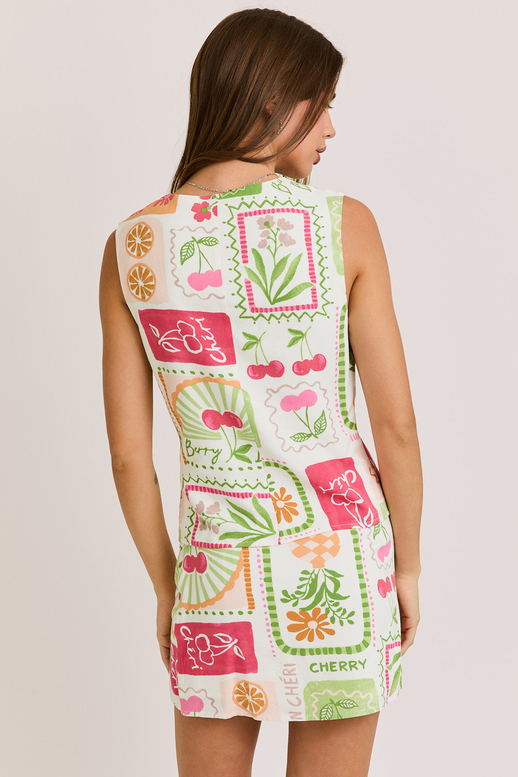 Mon Cheri Button Down Sleeveless Top with Slit Mini Skirt